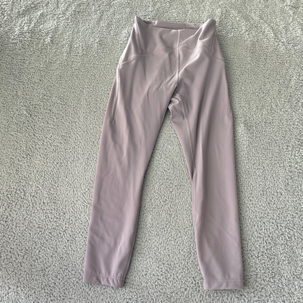 Lululemon Instill High-Rise Tight 25"
Violet Verbena size 4